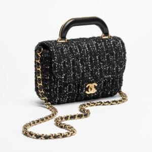 MINI FLAP BAG WITH TOP HANDLE
 
Cashmere Tweed & Gold-Tone Metal 
Black & White