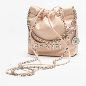 CHANEL 22 MINI HANDBAG
 
Shiny Calfskin & Silver-Tone Metal 
Beige