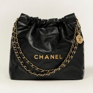CHANEL 22 SMALL HANDBAG
 
Shiny Calfskin & Gold-Tone Metal 
Black