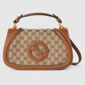 Gucci Blondie medium top handle bag
Variation
beige and dark brown GG canvas