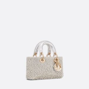 Dior Lady D-Joy micro bag in silver-tone satin with a gradient bead embroidery and pale gold-finish metal D.I.O.R. charms.