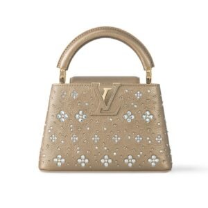 Louis Vuitton Capucines Mini handbag featuring mother-of-pearl effect Monogram flowers and gold-toned hardware