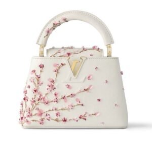 Louis Vuitton Capucines bag in white Taurillon leather with pink floral embellishments