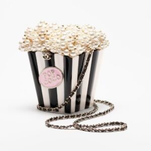 Chanel  Popcorn Minaudière bag in black and white resin with faux pearls and gold-tone hardware