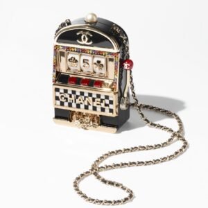 Chanel Slot Machine Minaudière bag in black, gold, and white resin with crystal embellishments and gold-tone metal hardware