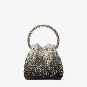 Jimmy Choo crystal-detail drawstring bucket bag embellished with a silver to black ombré gradient of crystals and a metallic braided round top handle.